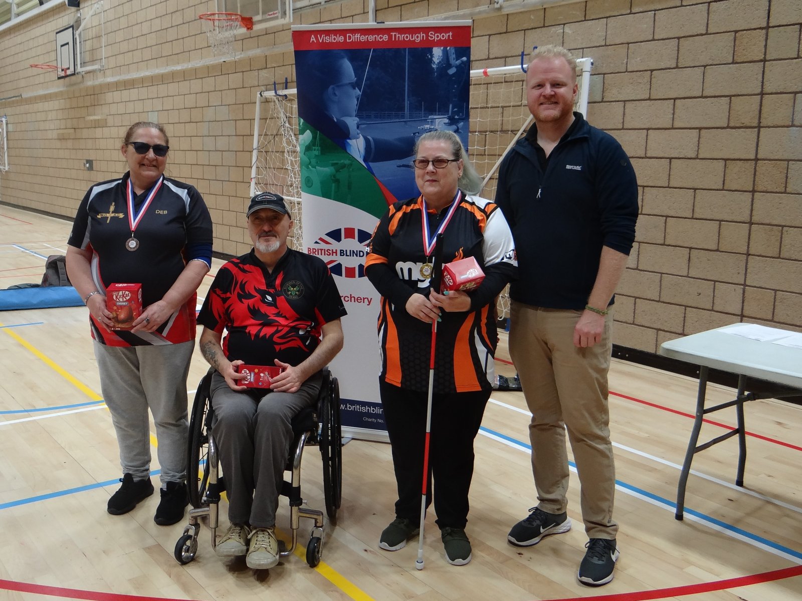 Debra Wright, Terry Piper and Andrea Thomas after competing in the BBS Archery Section Indoor Championships 2024 with Graham Rees Evans.