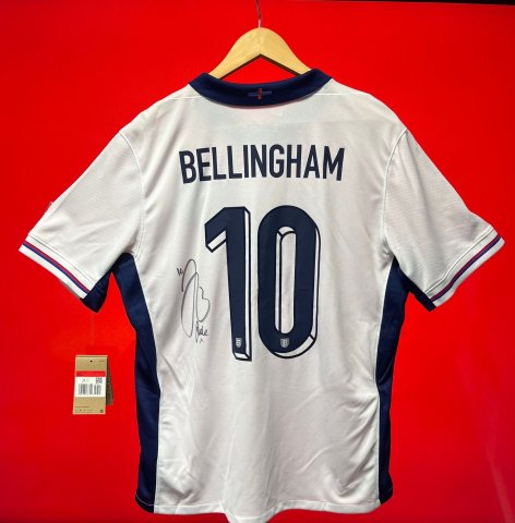 The back of an England Euro 2024 shirt signed by Jude Bellingham with the number 10 on it with 'BELLINGHAM' across the top of the shirt.